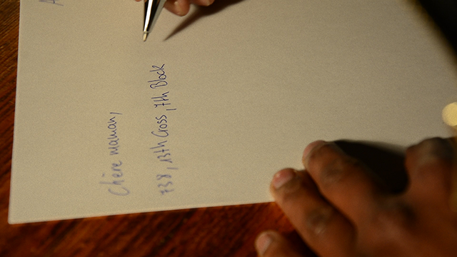 Mitri Luisier commence à écrire la lettre